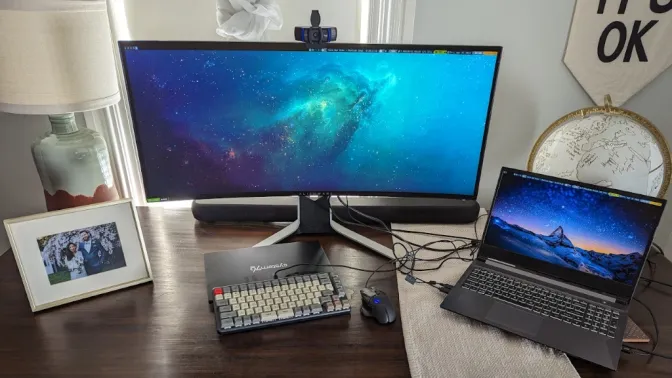 computer desktop with widescreen monitor