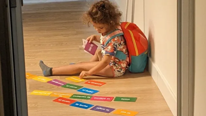 Nora with flashcards